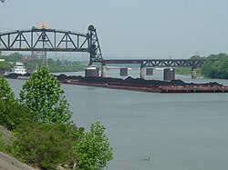 A barge hauling coal in the Louisville and Portland Canal, the only human-made section of the Ohio River
