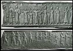 Two bronze fragments from an Assyrian palace gate depicting the collection of tribute from the Phoenician cities of Tyre and Sidon (859–824 BC). British Museum.