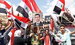 Pro-Assad demonstration in the capital Damascus after US-led missile strikes in April 2018