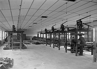 Textile machinery at the Cambrian Factory, Llanwrtyd, Wales in the 1940s.