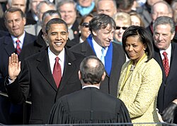 Photo of Obama raising his left hand for the oath of office