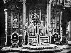The royal thrones, c. 1902. The Sovereign's throne (on left) is raised slightly higher than the consort's.