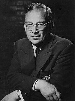 George Gamow smoking a cigarette.