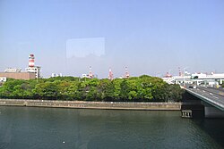 A forested region lining the Tokyo monorail planted to dampen noise and air pollution