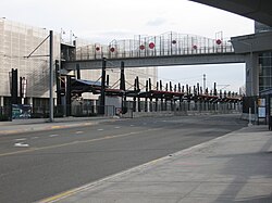 SODO Busway stop at South Royal Brougham Way with the Stadium light rail station in the background.
