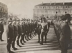 Major General John J. Pershing, accompanied by Captain George S. Patton, inspecting men of Patton's headquarters troop at American Expeditionary Forces (AEF) headquarters, Chaumont, France, 1917