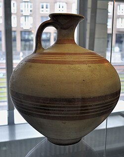 Aristotle used the analogy of the movement of water through a porous pot (an oenochoe shown) to help explain biological processes as mechanisms.