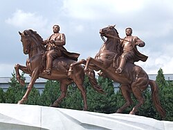 Equestrian statues of younger versions of Kim Jong Il (right) and Kim Il Sung, Pyongyang