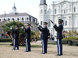Louisiana National Guardsmen from the Honor Guard team fire their rifles to commemorate the Battle of New Orleans during a ceremony in Jackson Square, New Orleans, January 8, 2010, at an event sponsored by the U.S. Daughters of 1812