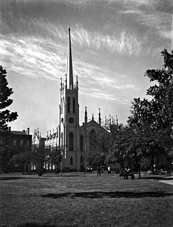 First Presbyterian Church on Lafayette Square, destroyed by the great hurricane of 1915, collapsing at 5:02pm.[18]