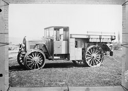 A Daimler truck with iron tyres.
