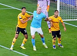 Haaland (centre) playing for Manchester City against Wolverhampton Wanderers in 2022