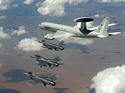 NATO E-3A flying with US Air Force F-16s in a NATO exercise