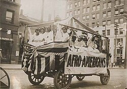 This parade float displayed the word "Afro-Americans" in 1911.