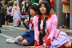Monogatari series cosplayers at Nippombashi Street Festa 2014
