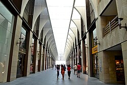 Shopping stores along vaulted alleys inside the Souks