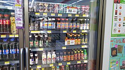 Assortment of energy drinks displayed in a convenience store in Bangkok, Thailand (2018)