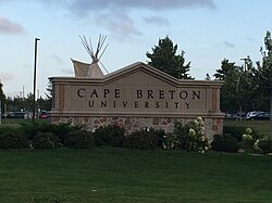 The main sign for the university, located in front of the Culture and Heritage Centre