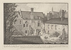 A monochrome illustration of several short buildings clustered in a small space. A yard in the foreground is filled with detritus.