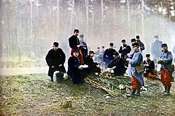 French soldiers rest in a forest during the battle of the Marne. Autochrome colour photograph.