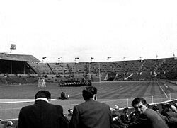 A marching band entertains the incoming crowd prior to the 1956 Rugby League Cup Final