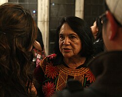Dolores Huerta is an activist for workers', immigrants' and women's rights. She was the first Hispanic inducted into the National Women's Hall of Fame, in 1993.[154][155]