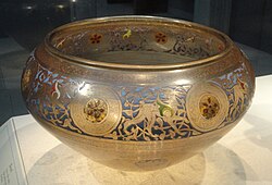 Mamluk-Syrian glassware vessel from the 14th century; in the course of trade, the middle vase shown ended up in Yemen and then China.