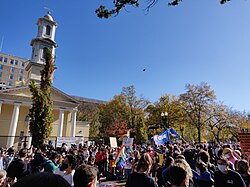 People celebrate in the streets near the White House after the major networks projected Biden the winner of the election on November 7.