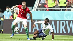 Szalai against Pogba of France, during Hungary's second group match of UEFA Euro 2020
