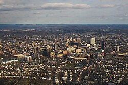 The city from the south with The Hill in the foreground. East Rock is visible in the background.
