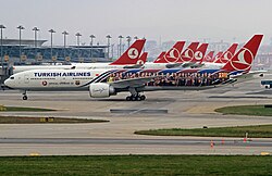 A Turkish Airlines Boeing 777-300ER with the FC Barcelona colours in 2012; the airline was the official sponsor and carrier of the club between 2010 and 2013.[29]