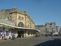 The entrance to the station, seen in 2006, before redevelopment as part of Union Square. The Station Hotel can be seen in the background.