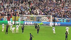 Mbappé scoring France's third goal with a penalty kick awarded in extra time