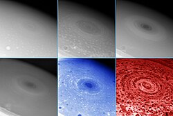 A hurricane-like storm on the south pole of Saturn displaying an eyewall tens of kilometers high