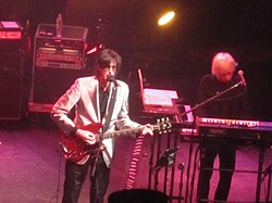 Ric Ocasek and Greg Hawkes of the Cars pictured in 2011. New wave fashion brought in a sleeker look to rock fashion during the early MTV era in the 1980s.