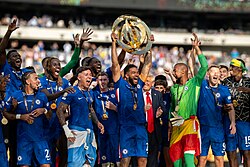 Chelsea captain Reece James lifting the Club World Cup trophy after winning the 2025 edition.