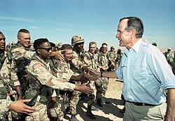 President Bush visiting American troops in Saudi Arabia on Thanksgiving Day, 1990