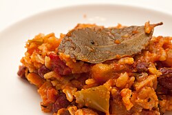 Jambalaya made with tomatoes showing a wetter consistency