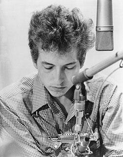 Bob Dylan, 1963 promo photo by Don Hunstein for The Times They Are a-Changin' in a recording studio