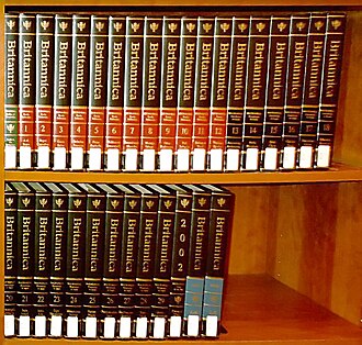 The 15th edition of the Britannica; the initial volume with the green spine is the Propædia; the red-spined and black-spined volumes are the Micropædia and the Macropædia, respectively. The last three volumes are the 2002 Book of the Year (black spine) and the two-volume index (cyan spine).
