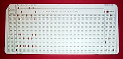 A 1970s punched card containing one line from a Fortran program. The card reads: "Z(1) = Y + W(1)" and is labeled "PROJ039" for identification purposes.