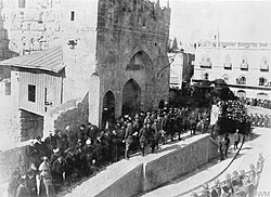Official entry to Jerusalem, 11 December 1917. General Allenby at the steps of the Citadel (entrance to David's Tower) listening to the reading of the Proclamation of Occupation in seven languages.