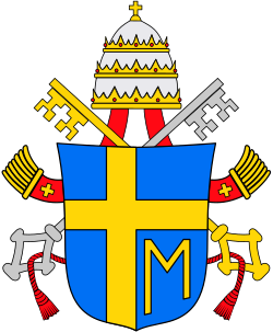 The coat of arms of John Paul II displaying the Marian Cross with the letter M signifying the Blessed Virgin Mary, the mother of Jesus