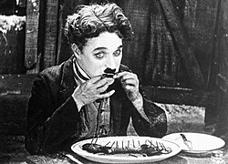 The Tramp resorts to eating his boot in The Gold Rush (1925).