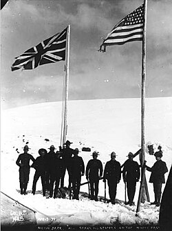 The Union Flag and the U.S. flag at the Canada-U.S. border, 1899. The Union Flag was the formal flag of Canada until 1965.