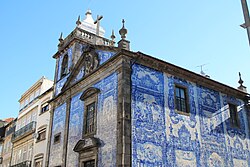 Azulejos are a distinctive feature of Portuguese architecture as it is the case with Capela das Almas [pt], in Porto