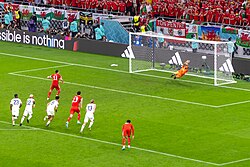 Bale scores Wales's first World Cup goal since 1958 from the penalty spot.