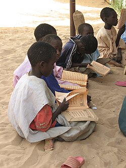 Boys studying the Quran in Touba, Senegal