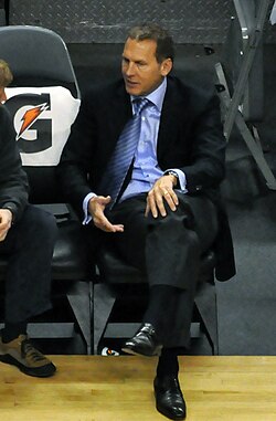 Bryan Colangelo (right) at a Raptors game in 2009. He was the team's general manager, and president of basketball operations from February 2006 to May 2013.