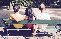 Three people in a polyamorous relationship.